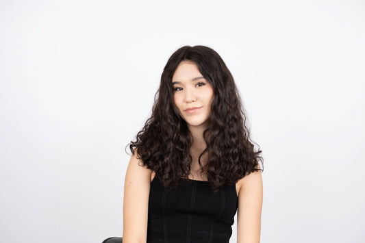 Model is wearing an 18 Curly Yuliya